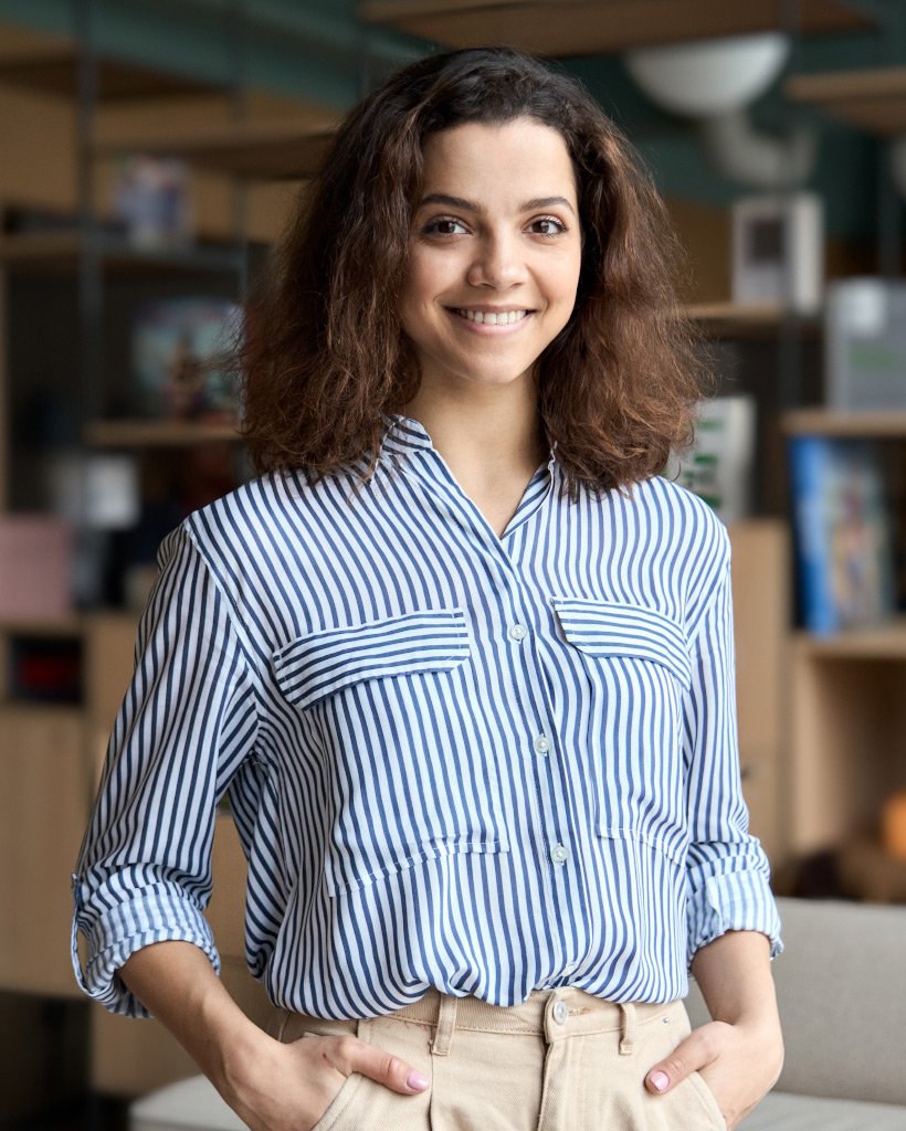 young latin girl student looking at camera standin 9XHKT7A